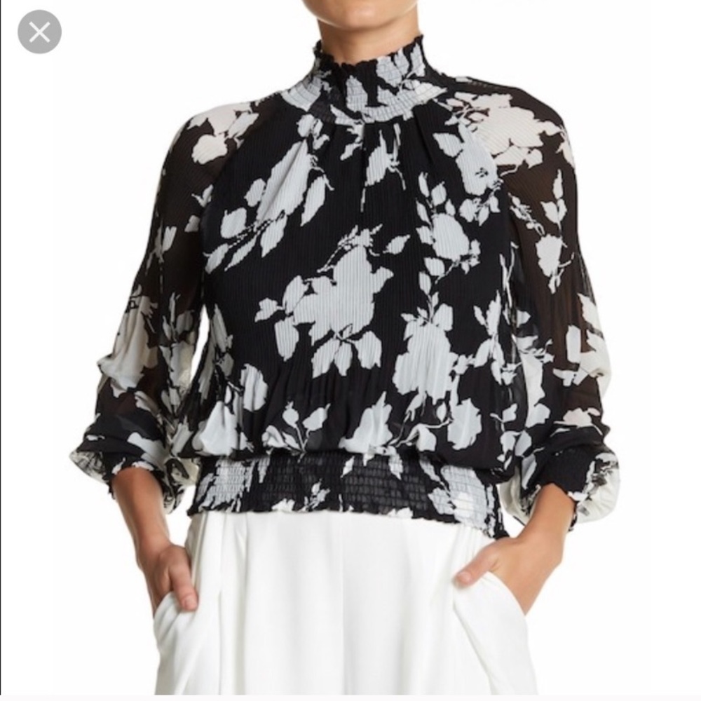 Garcia pleated floral blouse.
